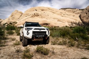 Toyota 4Runner Front Bumper - Body Armor 4x4 - HiLine Front Winch Bumper with Two-Stage Light Texture Finish - Black - `14-`23